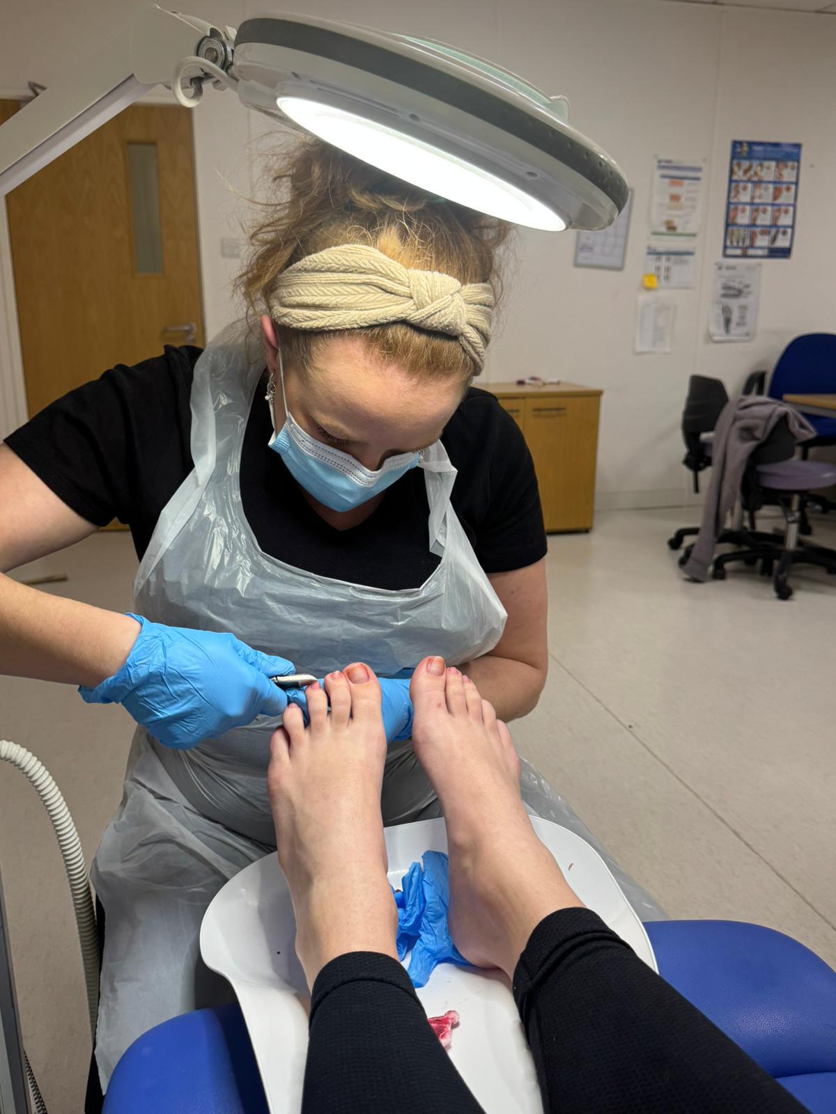 Close-up of gentle nail treatment in progress